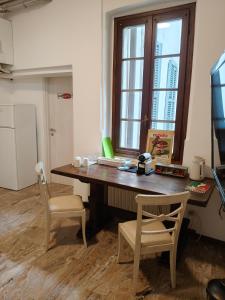 TV a/nebo společenská místnost v ubytování MARTINI e CAMPARI