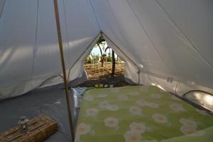 Postel nebo postele na pokoji v ubytování Bella Baia Campsite