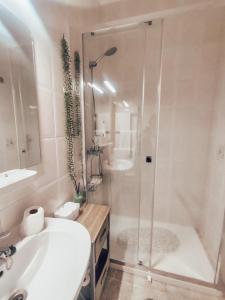 a bathroom with a shower and a sink and a tub at Villa Victoria, Tonel, Sagres in Sagres +12 photos