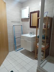 a bathroom with a sink and a mirror at Studio Pohoda Na Razcesti Cingov Slovensky Raj in Spišské Tomášovce +41 photos