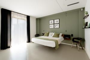 a bedroom with a large bed and a window at Villa Monterosso, Acicastello in Aci Castello +62 photos