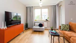 Et tv og/eller underholdning på Rezydencja Wintera i Lastadia by Apartmore