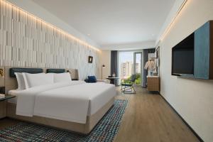 Μια τηλεόραση ή/και κέντρο ψυχαγωγίας στο Urna S Hotel Urumqi International Convention and Exhibition Center