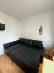 Et opholdsområde på Studio Manuia Climatisé au centre ville + 5 billeder