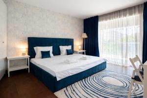 Postel nebo postele na pokoji v ubytování Alia Apartment + 72 fotografií