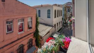 an overhead view of a city street with flowers at Balat Side Apart in Istanbul