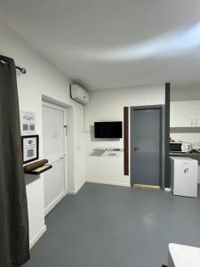 Dapur atau dapur kecil di Apartamentos Santiago - Tarrafal