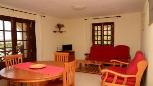 TV a/nebo společenská místnost v ubytování Apt. Heliconia Nº 4