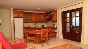 Kuchyň nebo kuchyňský kout v ubytování Apt. Heliconia Nº 4 + 30 fotografií