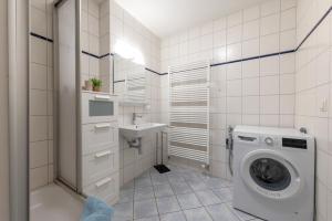 Ένα μπάνιο στο Villa Vilmblick Ferienwohnung Hafenglück +13 φωτογραφίες