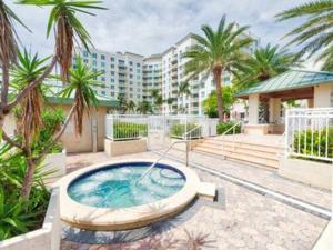 a hot tub on the patio of a resort at Apartment In Casa Costa Condo!beach Pass Included in Boynton Beach