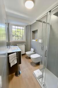 Et badeværelse på Casa del Borgo + 2 billeder