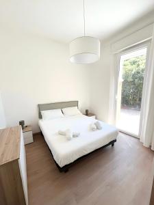 En eller flere senge i et værelse på Casa del Borgo