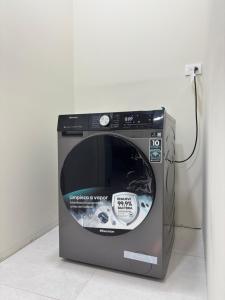 a microwave oven sitting on top of a counter at Apartment in the heart of SA in Santa Ana