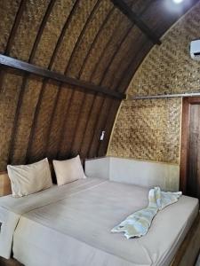 Кровать или кровати в номере Warna Cottage