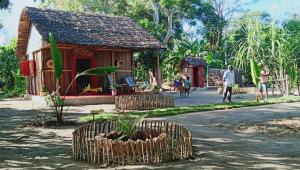 a small house in the middle of a street at Maison Des Voyageurs in Ambanja