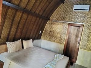 Кровать или кровати в номере Warna Cottage