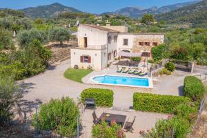 an aerial view of a house with a swimming pool at Sa Corterada in El Port de la Selva