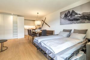 Postel nebo postele na pokoji v ubytování Proventus Apartments