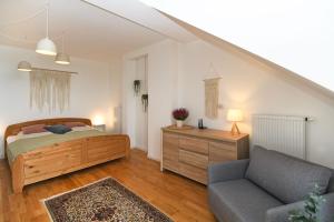 Ένα ή περισσότερα κρεβάτια σε δωμάτιο στο Apartament MALIN