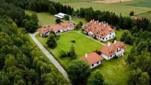 an aerial view of a large house with red roofs at Apartament ,, Studio '' in Nasutów