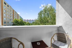 Balkón nebo terasa v ubytování Spacious 3-Bedroom Apartment with Park View in Petržalka