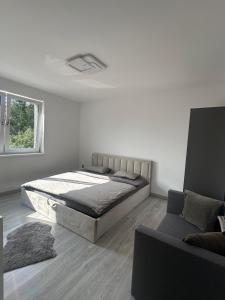 Ένα ή περισσότερα κρεβάτια σε δωμάτιο στο Stylish house terrace and garage +14 φωτογραφίες