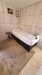 乌贝兰迪亚kitnet 04 - Zona Sul Karaiba Prox UMC, Patio Vinhedos e Shopping的相册照片