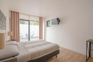 Televisyen dan/atau pusat hiburan di Heart Of Mexico Citycozy Condo W Balcony & Wifi