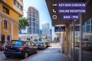 a city street with cars parked on the street at Business & Family Ambiente Apartments in Bratislava
