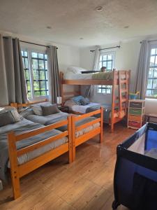 Postel nebo postele na pokoji v ubytování Casa en Costa Quilen + 23 fotografií