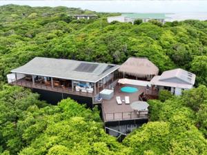 an aerial view of a house in the trees at Santa Vista 1 in Santa Maria
