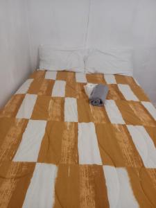Ένα ή περισσότερα κρεβάτια σε δωμάτιο στο 3 friends guest house