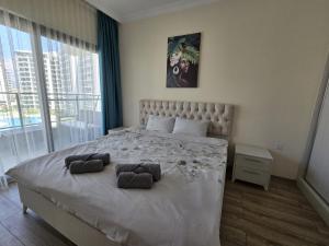 Postel nebo postele na pokoji v ubytování Charming 1+1 Caesar Resort Apartment