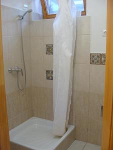 Ένα μπάνιο στο Kőszikla Apartman