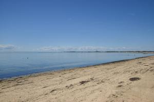 a view of the beach from the shoreline at Beachfront with Stunning Views in Truro