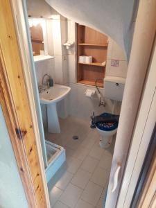 a bathroom with a toilet and a sink at Villa-Litsa in Leptokaria