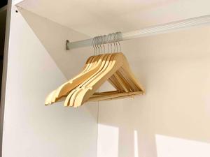 a wooden hanger is hanging from a ceiling at The Podium-Studio-Free 1 Parking-6 Pax-D335B in Kuching