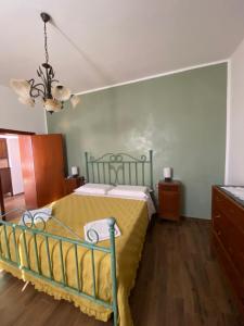 Postel nebo postele na pokoji v ubytování Appartamento La Clessidra