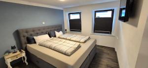 Ένα ή περισσότερα κρεβάτια σε δωμάτιο στο Annenblick