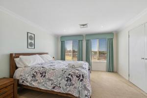 Ένα ή περισσότερα κρεβάτια σε δωμάτιο στο Yakkan Lodge