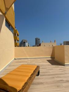 a mattress on the roof of a building at Mamba Garden III in Calpe