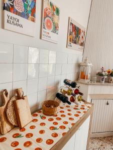 a kitchen with a counter top with food on it at Hortensia Home in Iglesias