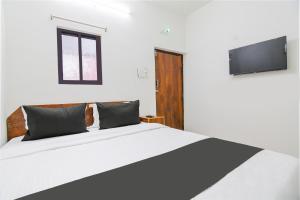 Postel nebo postele na pokoji v ubytování HOTEL O SP