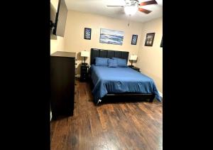 Voodi või voodid majutusasutuse Miami Court Cottage toas