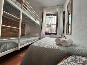 Postel nebo postele na pokoji v ubytování El balcón del Príncipe