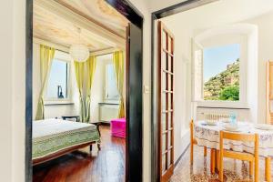 Ένα ή περισσότερα κρεβάτια σε δωμάτιο στο 4 beds-sea view with private garage