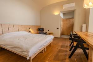 Ένα ή περισσότερα κρεβάτια σε δωμάτιο στο Central Square Apartments - Центральна площа міста