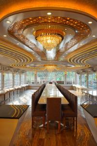 a large dining room on a cruise ship at Green tourism Alleppey in Alleppey