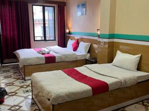 Ένα ή περισσότερα κρεβάτια σε δωμάτιο στο Myagdi Korola Guest House and Bhanchha Ghar